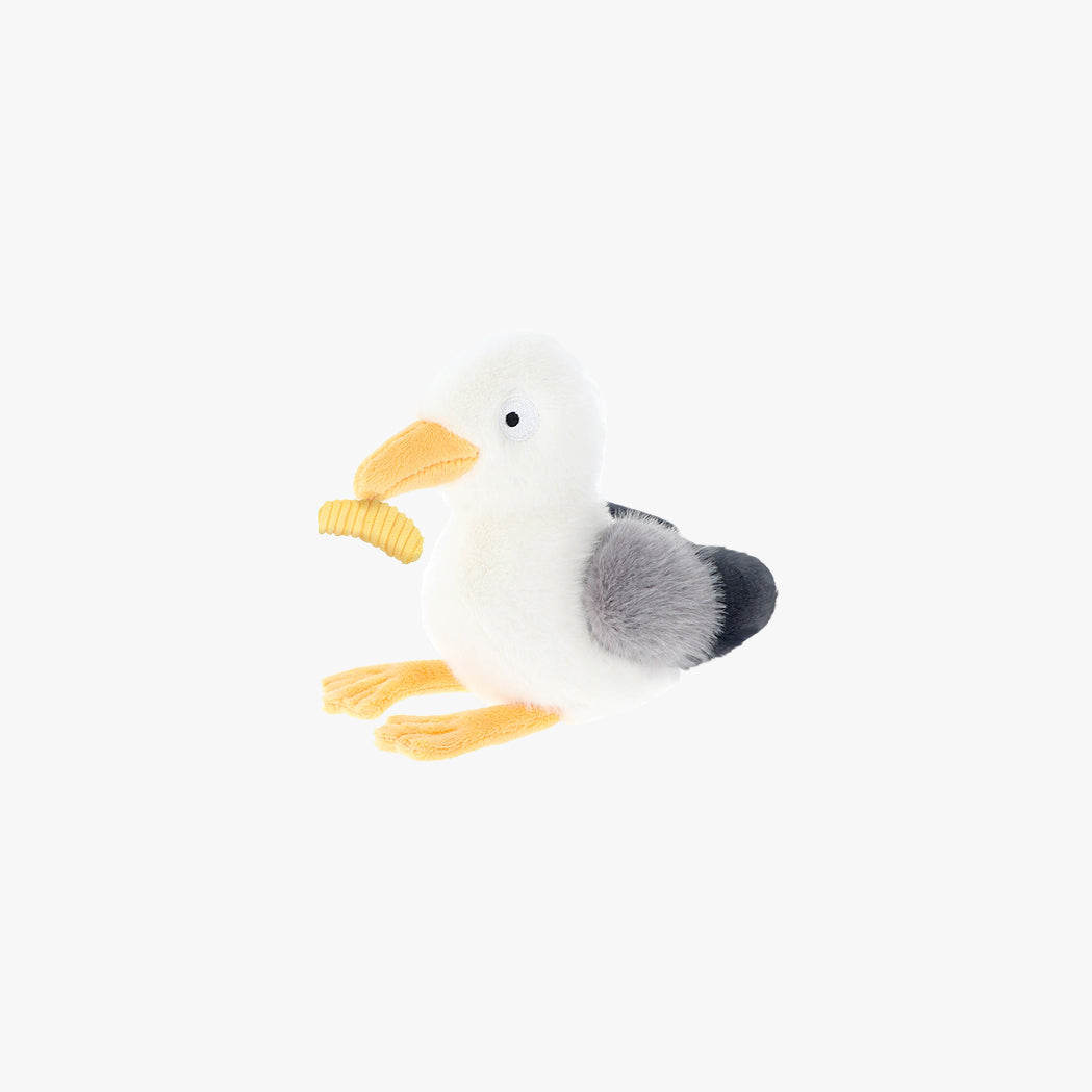 Stuffed toy seagull on a white background