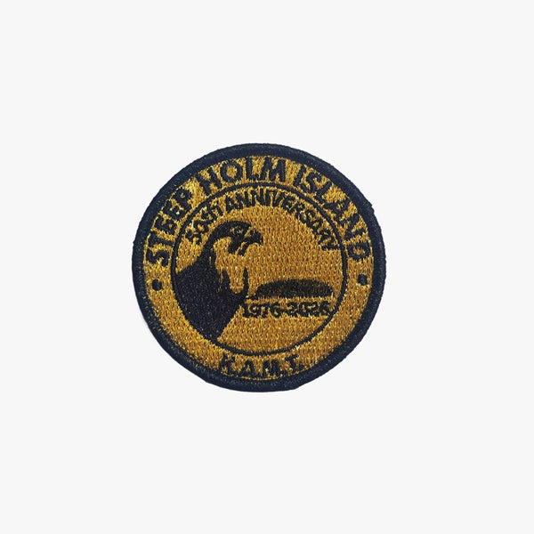 Round embroidered patch with text and a logo on a white background